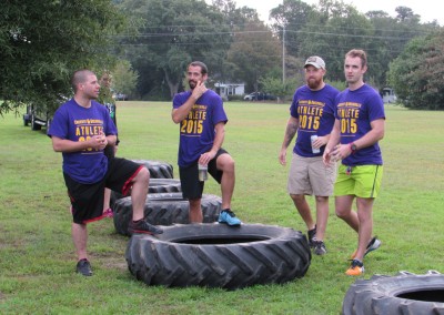 guys standing on tires